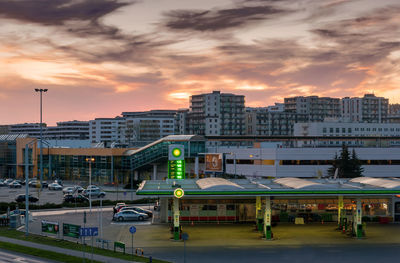 High angle view of buildings against sky during sunset