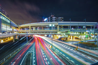 High angle view of light trails on road at night