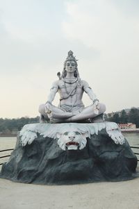 Buddha statue against sky