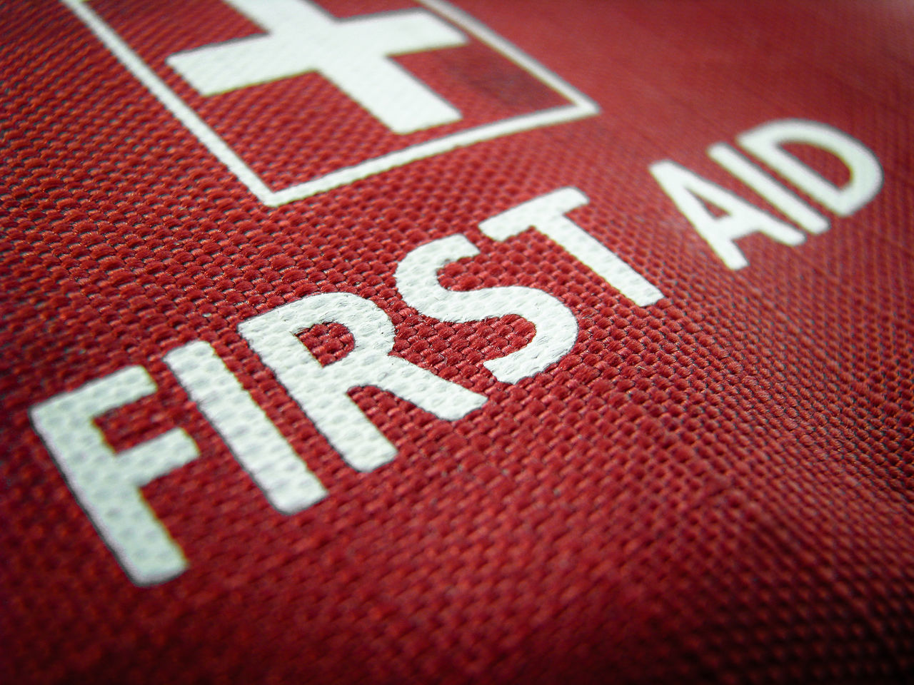 FULL FRAME SHOT OF RED AND TEXT ON CARPET