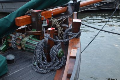 High angle view of rope tied on pier