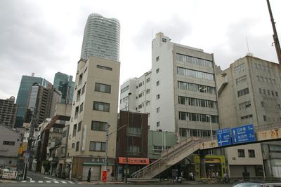 Low angle view of skyscrapers against sky