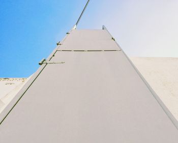 Low angle view of tree against clear blue sky