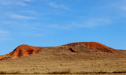 Scenic view of desert against sky