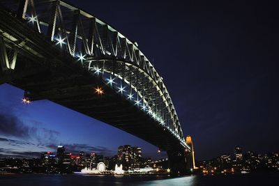 Low angle view of illuminated sydney harbor bridge at night