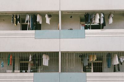 Low angle view of clothes drying outside building