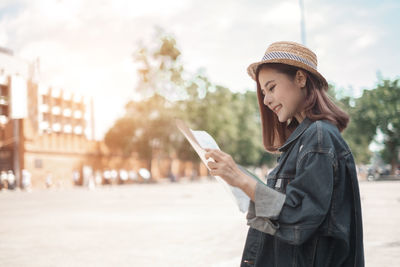 Young woman using mobile phone