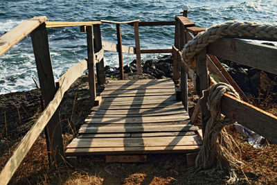 High angle view of wooden pier at sea