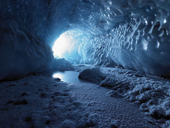 Light streaming into an ice cave in iceland