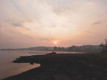 Scenic view of sunset against sky