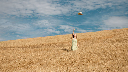 Rear view of woman playing soccer