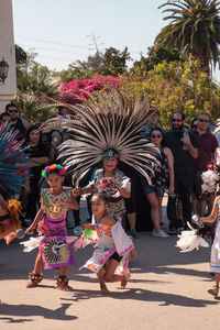 People in traditional clothing during festival