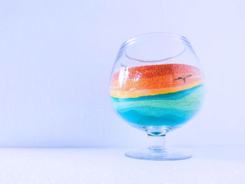 Close-up of drink against white background