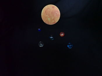 View of bubbles against black background