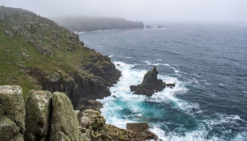 Scenic view of rocks in sea