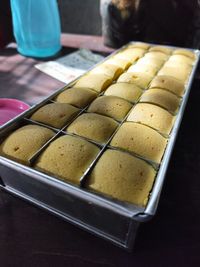 High angle view of a freshly baked chiffon cake on table