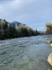 Scenic view of river against sky