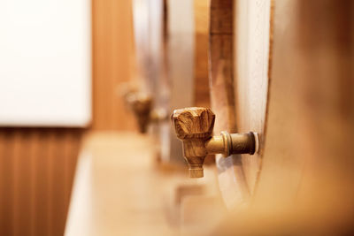 Close up of wooden faucet