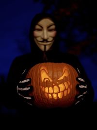 Close-up of illuminated pumpkin at home