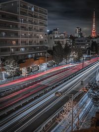 High angle view of light trails on road against sky