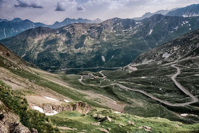 Aerial view of mountain range against sky