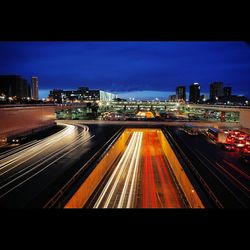 High angle view of light trails on road