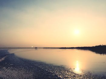 Scenic view of sea at sunset