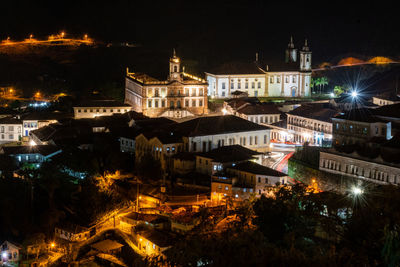 High angle view of illuminated buildings at night