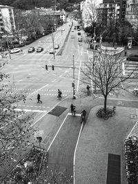 High angle view of people walking on road