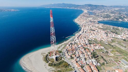 High angle view of sea amidst buildings in city