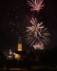 Firework display at night