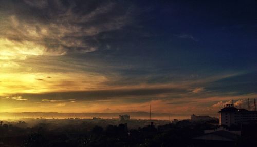 Scenic view of dramatic sky during sunset