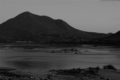 Scenic view of desert against clear sky