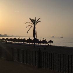 Scenic view of calm sea against clear sky