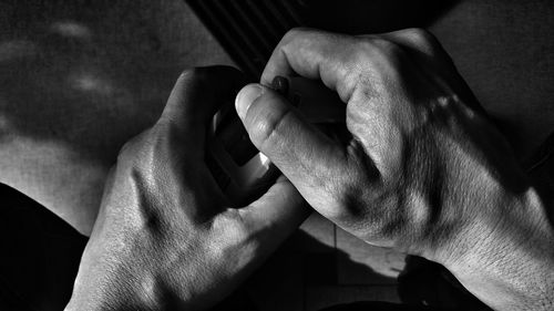 Close-up of hand holding hands