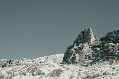 Scenic view of snowcapped mountain against sky