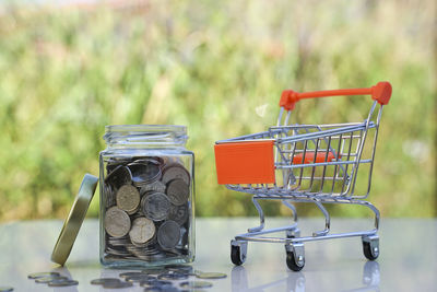 Close-up of coins on table