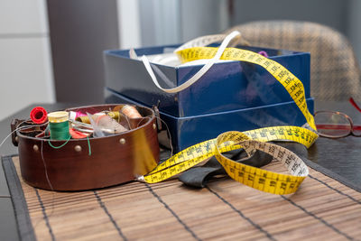 Close-up of yellow basket on table