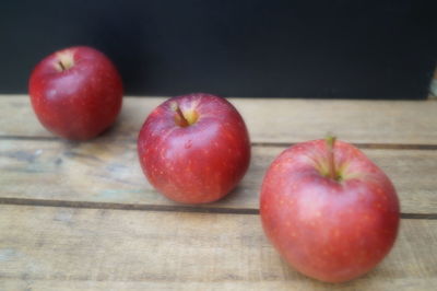 Close-up of apples on table
