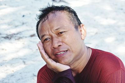 Portrait of mature man at beach