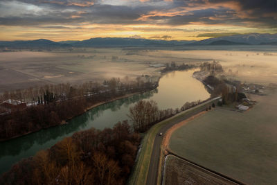 Aerial view of a skagit river sunrise. the sun comes up behind mt. baker in the background. 