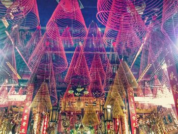 Low angle view of illuminated christmas lights