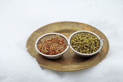 High angle view of spices in bowls on table