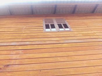 Low angle view of window on hardwood floor