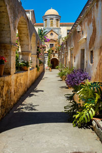 Alley amidst buildings in city