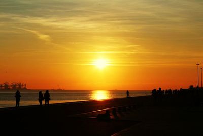 Scenic view of sea at sunset