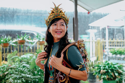 A woman is wearing traditional clothes