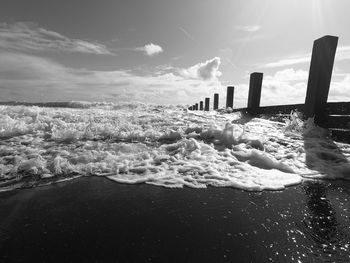 Scenic view of sea against sky during winter