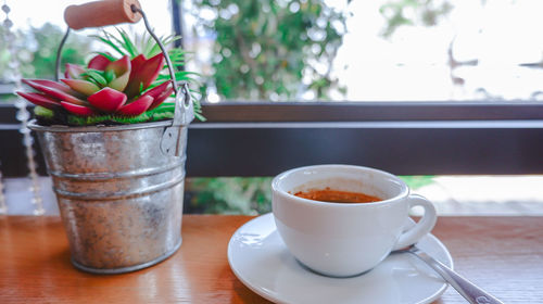 Close-up of coffee served on table