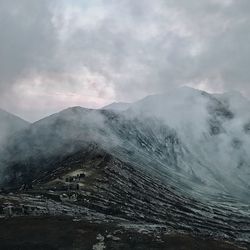 Scenic view of volcanic landscape against sky